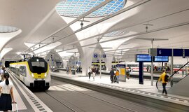 Eine simulierte Ansicht eines Untergrundbahnhofes mit großen Lichtdurchlässigen kreisrunden Löchern in der Decke. Im linken Bildrand steht ein weiß-gelber Zug und Menschen stehen am Bahnsteig. In der Mitte sieht man einen Bahnsteig, auf dem Menschen laufen. Im rechten Bildrand steht ein weißer ICE mit roter Linie am Bahnsteig. Eine simulierte Ansicht eines Untergrundbahnhofes mit großen Lichtdurchlässigen kreisrunden Löchern in der Decke. Im linken Bildrand steht ein weiß-gelber Zug und Menschen stehen am Bahnsteig. In der Mitte sieht man einen Bahnsteig, auf dem Menschen laufen. Im rechten Bildrand steht ein weißer ICE mit roter Linie am Bahnsteig.