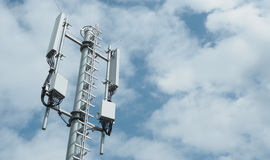 Foto shows FRMCS Antenna in front of a blue sky with white clouds Foto shows FRMCS Antenna in front of a blue sky with white clouds