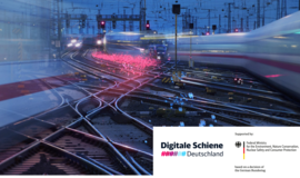 Several tracks connected by rails. An ICE rushes over them.