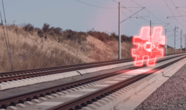 Ein neon roter Hashtag der über Gleisen schwebt.