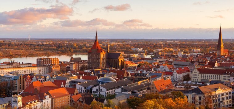 View of Rostock's historic city centre in the foreground of the Warnow river